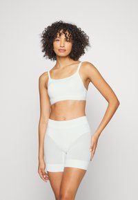 Корректирующее белье Корректирующее белье