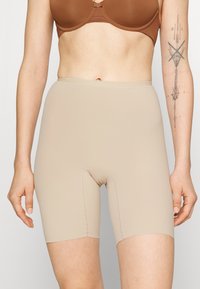 Корректирующее белье Корректирующее белье