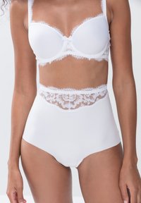 Корректирующее белье Корректирующее белье