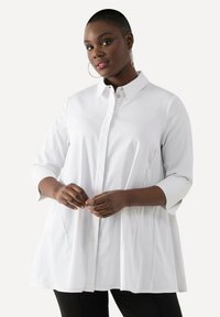 Длинная блузка Длинная блузка