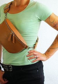 Сумка на пояс Сумка на пояс