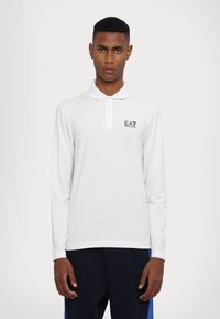 Поло с длинным рукавом Поло с длинным рукавом