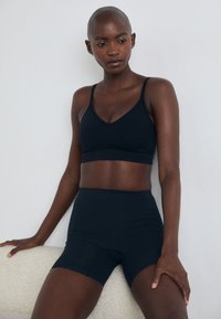 Корректирующее белье Корректирующее белье