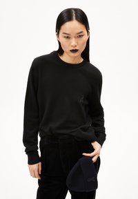 Длинный пуловер Длинный пуловер