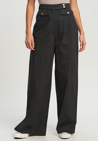 Широкие брюки Широкие брюки