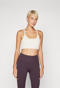 Спортивный бюстгальтер Спортивный бюстгальтер