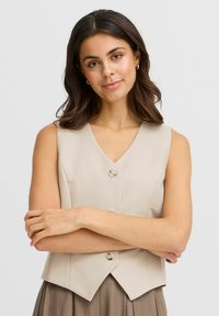 Джинсовая жилетка Джинсовая жилетка