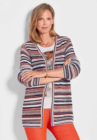 Длинный жилет Длинный жилет