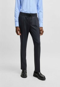 Костюмные брюки Костюмные брюки