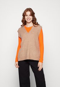 Длинный жилет Длинный жилет