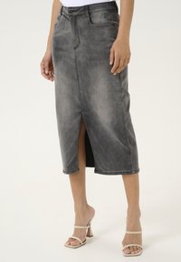 Юбка с накладными карманами Юбка с накладными карманами