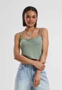 Топ на бретельках Топ на бретельках