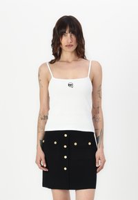 Топ на бретельках Топ на бретельках