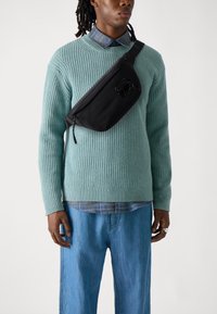 Сумка на пояс Сумка на пояс