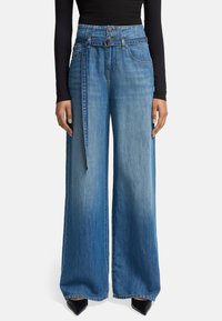 Широкие брюки Широкие брюки