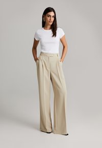 Широкие брюки Широкие брюки