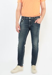 Узкие джинсы Узкие джинсы