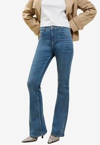 Клешеные брюки Клешеные брюки