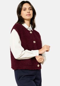 Джинсовая жилетка Джинсовая жилетка