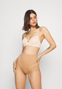 Корректирующее белье Корректирующее белье