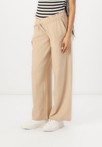 Широкие брюки Широкие брюки