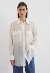 Длинная блузка Длинная блузка