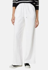 Широкие брюки Широкие брюки