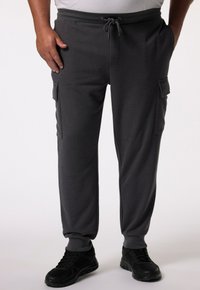 Брюки с накладными карманами Брюки с накладными карманами