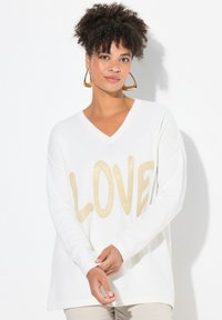 Длинный пуловер Длинный пуловер