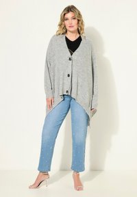 Длинный жилет Длинный жилет