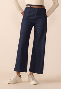 Широкие брюки Широкие брюки