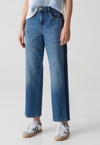 Свободные джинсы Свободные джинсы