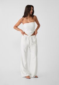 Широкие брюки Широкие брюки