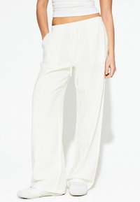 Широкие брюки Широкие брюки