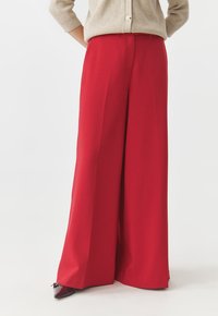 Широкие брюки Широкие брюки