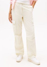 Брюки с накладными карманами Брюки с накладными карманами