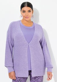 Длинный жилет Длинный жилет