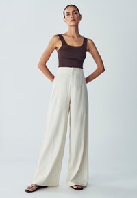 Широкие брюки Широкие брюки