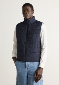 Жилет Жилет