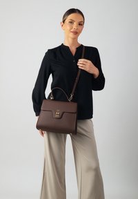 Кожаная сумка Кожаная сумка