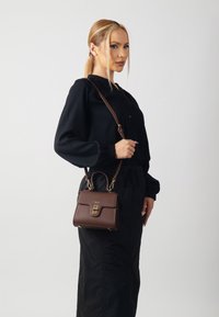 Кожаная сумка Кожаная сумка