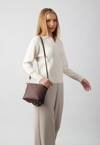 Кожаная сумка Кожаная сумка