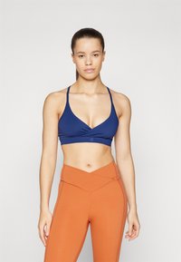 Спортивный бюстгальтер Спортивный бюстгальтер