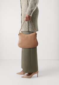 Кожаная сумка Кожаная сумка