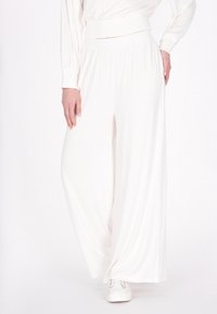 Широкие брюки Широкие брюки