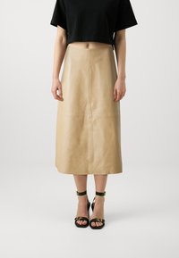 Кожаная юбка Кожаная юбка