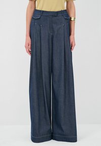 Свободные джинсы Свободные джинсы