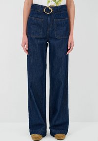 Свободные джинсы Свободные джинсы