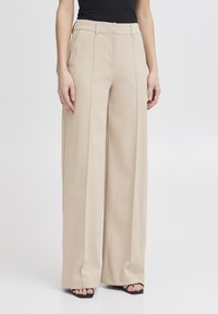 Широкие брюки Широкие брюки