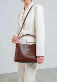 Кожаная сумка Кожаная сумка